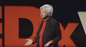 Olga delivering her TED TALK in 2015.