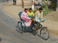 Experience the madness of Indian roads from a rickshaw. 