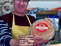 The friendly cheese vendor who wanted to sell me my favorite "epoisse" stinky cheese. 
