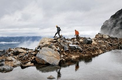 Hikers on the rocky shores of the Gulf Islands