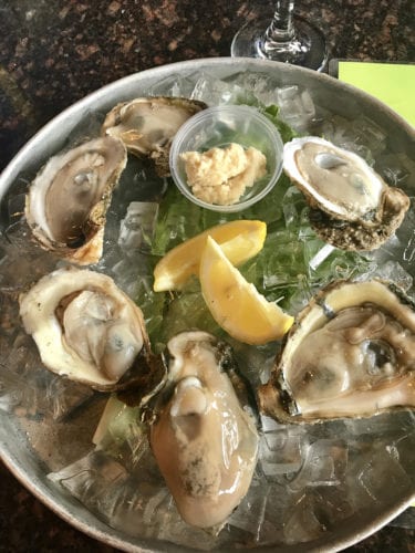 Charleston happy hour with fresh oysters