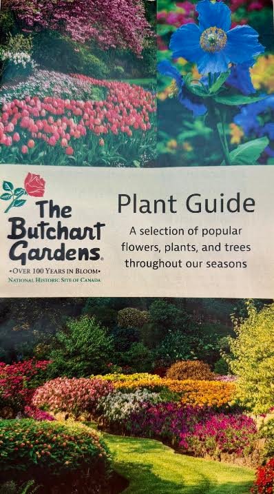 Gutsy Traveler: Cover of The Butchart Gardens plant guide featuring photos of flower beds and a blue poppy, popular with those planning an Alaska cruise.